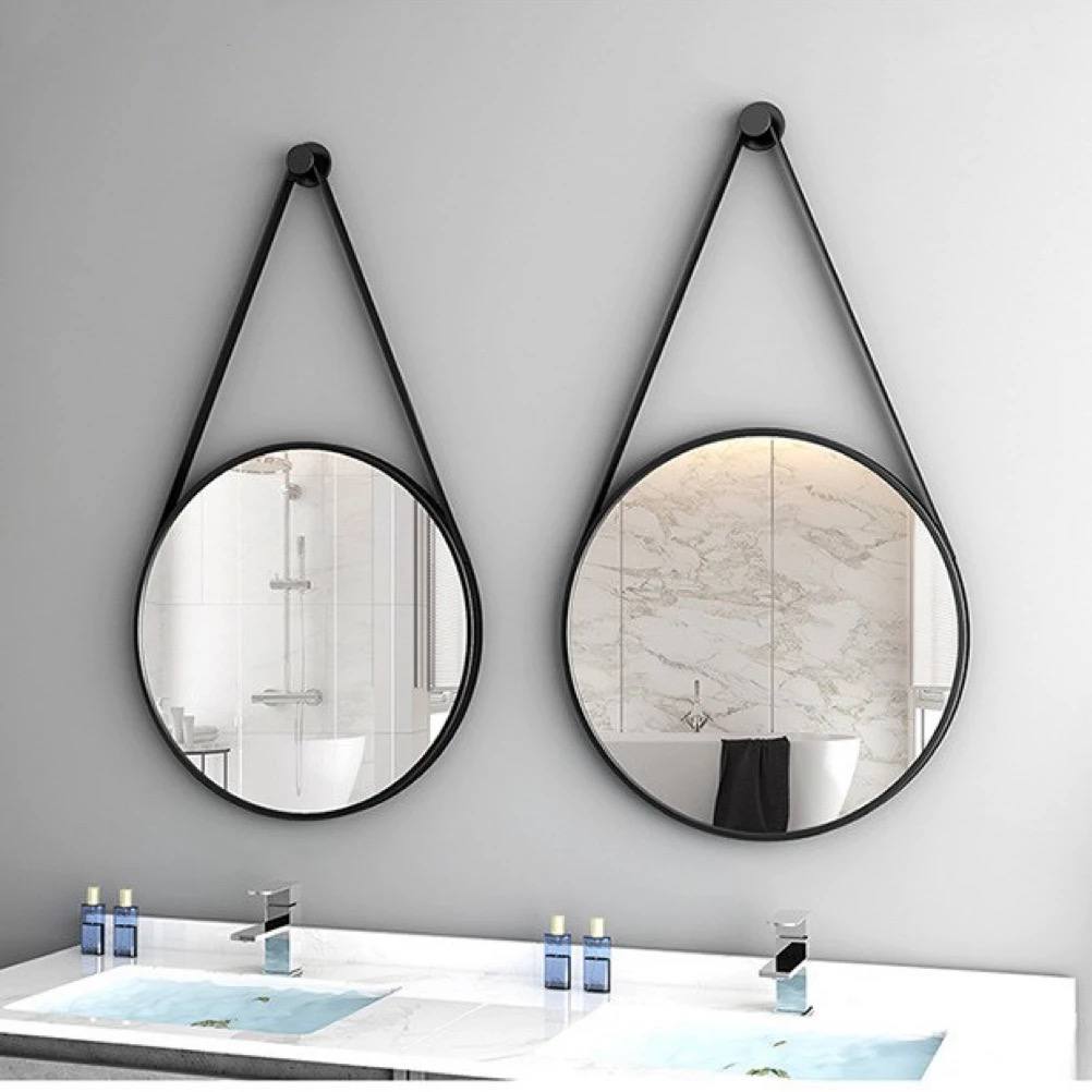 Circular wall mirror with a hanger